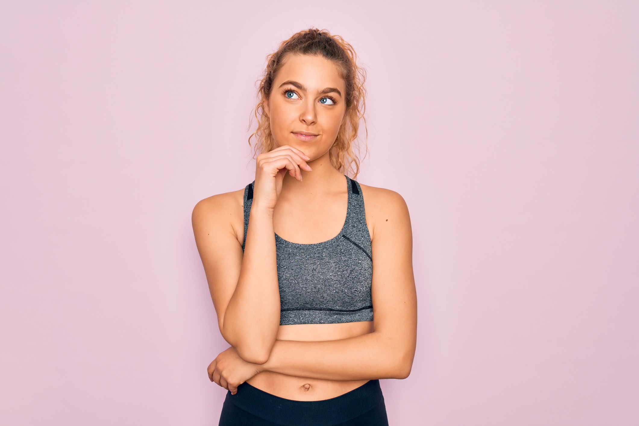 Woman thinking; how to choose a fitness niche